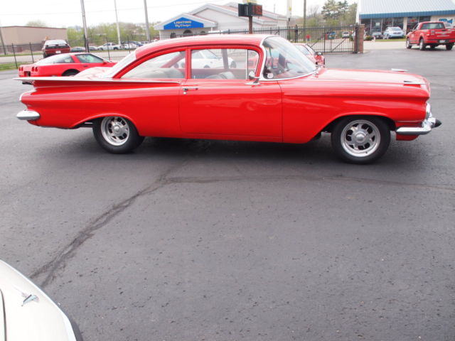 1959 Red Chevrolet Bel Air/150/210
