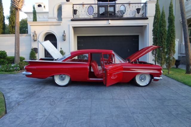 1959 Red/white Chevrolet Biscayne Coupe
