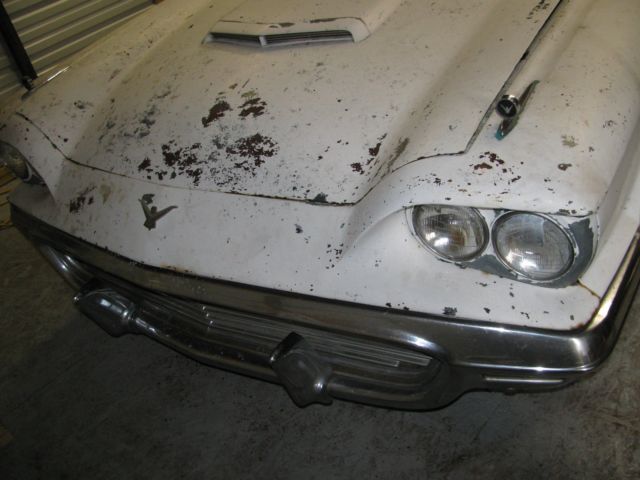 1959 white Ford Thunderbird Coupe