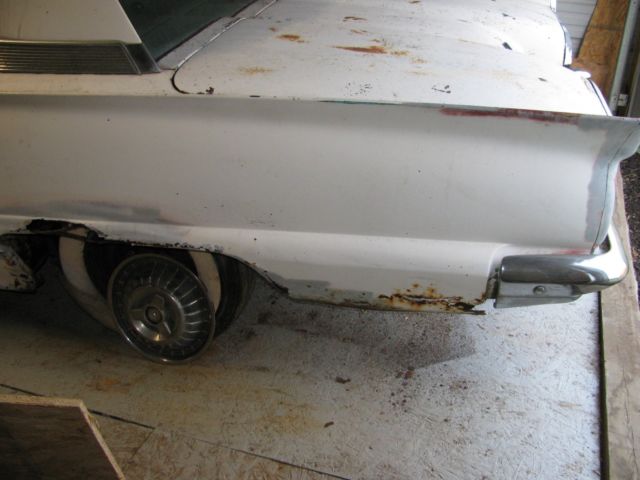 1959 white Ford Thunderbird Coupe