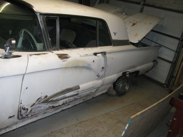 1959 white Ford Thunderbird Coupe