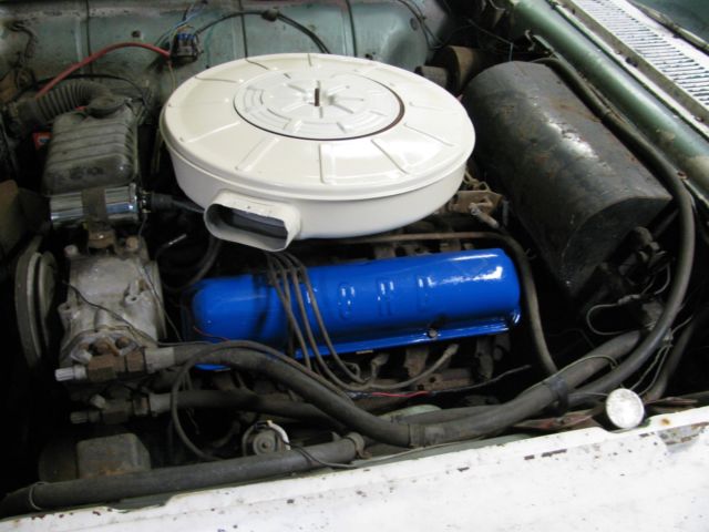 1959 white Ford Thunderbird Coupe