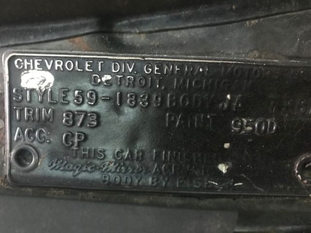 1959 Black body, white on top of roof and deck Chevrolet Impala 4 door hardtop