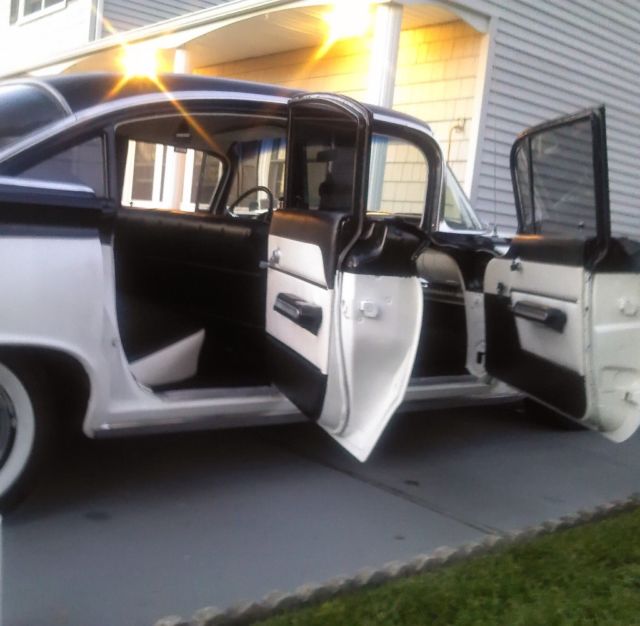 1959 Black and white Oldsmobile Eighty-Eight Sedan