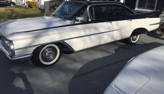 1959 Black and white Oldsmobile Eighty-Eight Sedan
