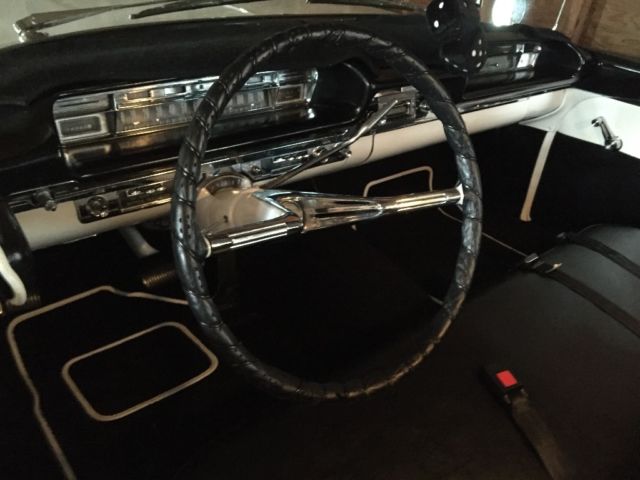 1959 Black and white Oldsmobile Eighty-Eight Sedan