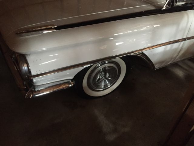 1959 Black and white Oldsmobile Eighty-Eight Sedan