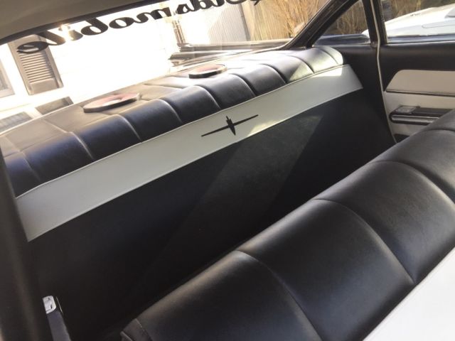 1959 Black and white Oldsmobile Eighty-Eight Sedan