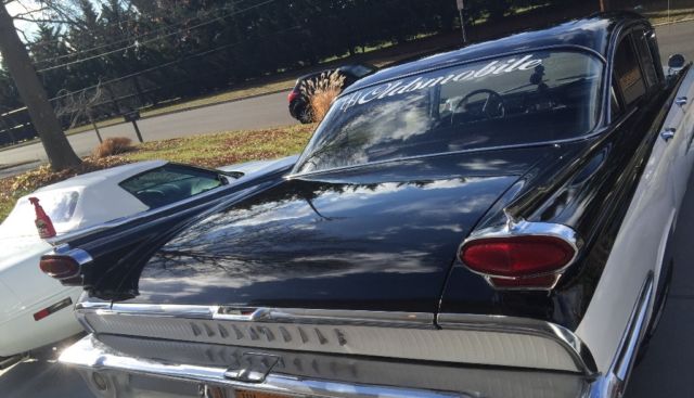 1959 Black and white Oldsmobile Eighty-Eight Sedan