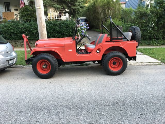 1959 Red Willys cj5 jeep