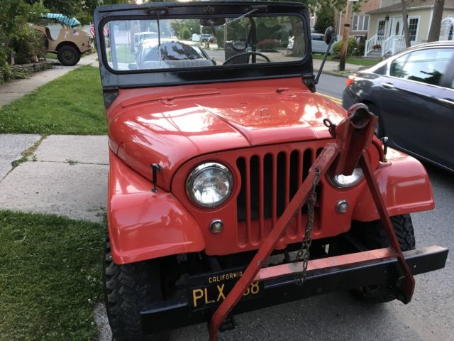 1959 Red Willys cj5 jeep