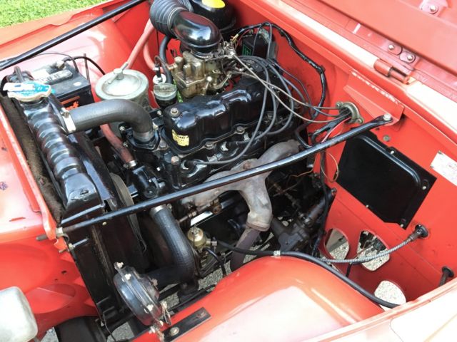 1959 Red Willys cj5 jeep