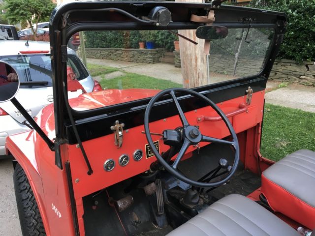 1959 Red Willys cj5 jeep