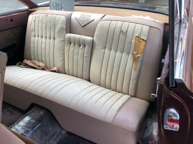 1960 Burgundy Cadillac Series 62 Coupe