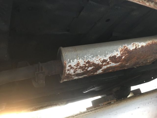 1960 fawn Cadillac DeVille Convertible