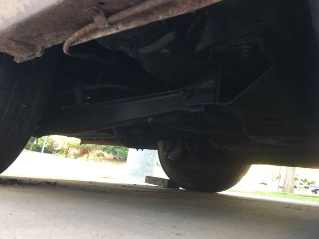 1960 fawn Cadillac DeVille Convertible