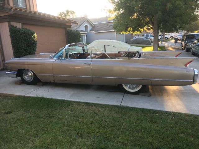 1960 fawn Cadillac DeVille Convertible