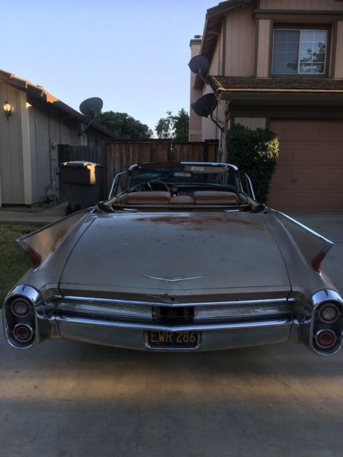1960 fawn Cadillac DeVille Convertible