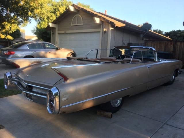 1960 fawn Cadillac DeVille Convertible