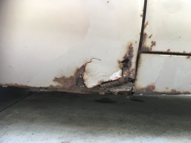 1960 fawn Cadillac DeVille Convertible