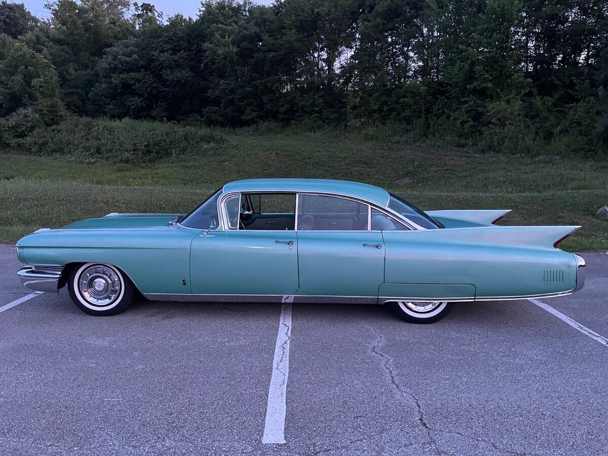 1960 Red Cadillac Fleetwood Sedan