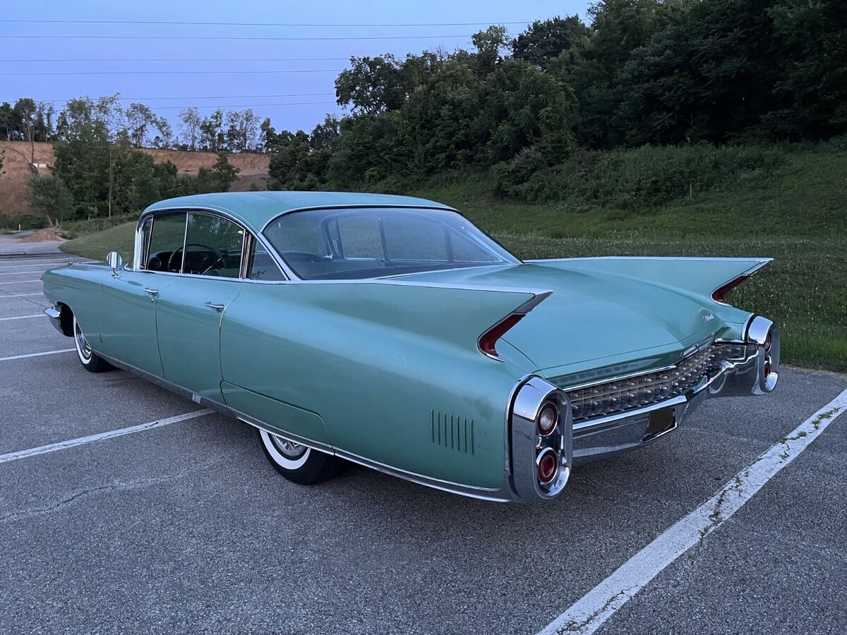 1960 Red Cadillac Fleetwood Sedan