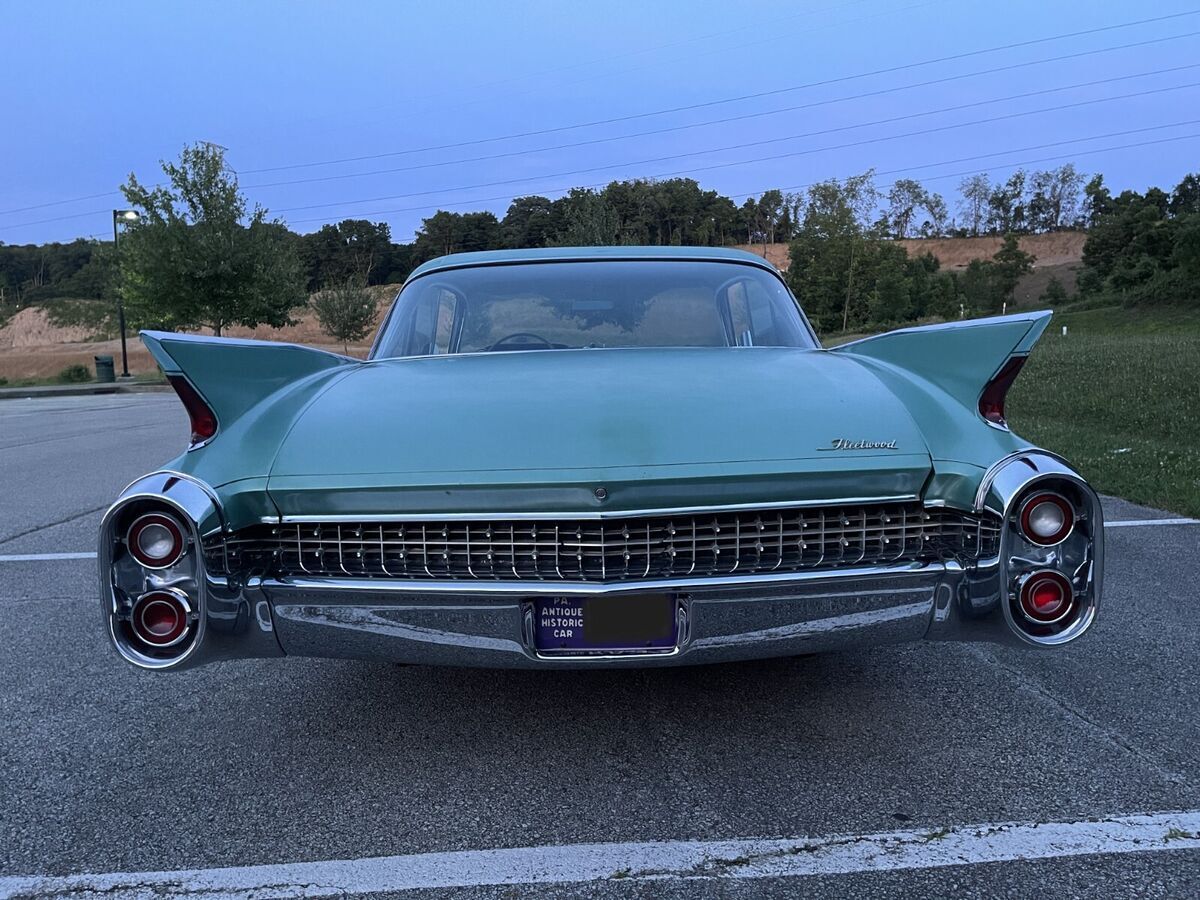1960 Red Cadillac Fleetwood Sedan