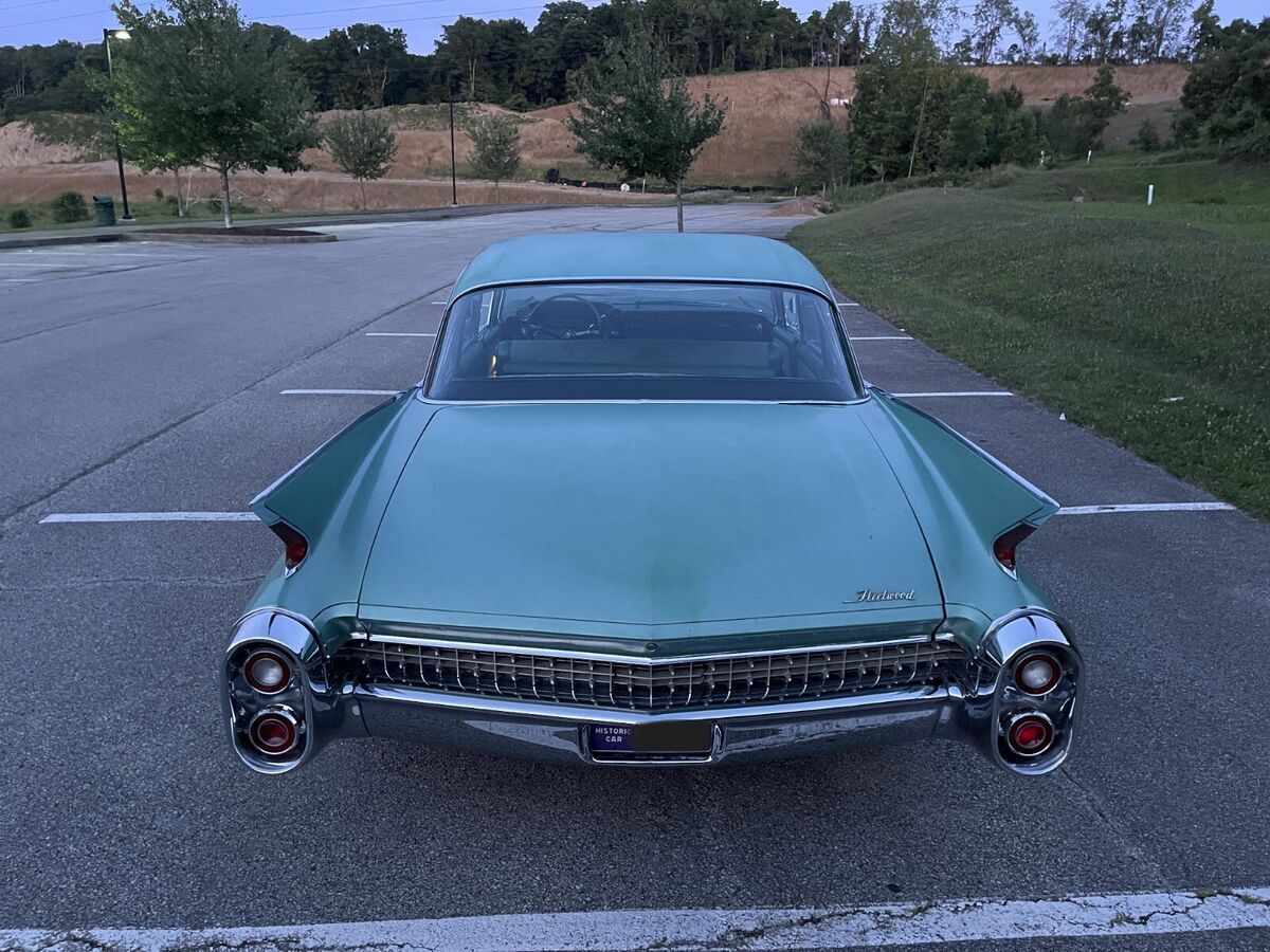 1960 Red Cadillac Fleetwood Sedan