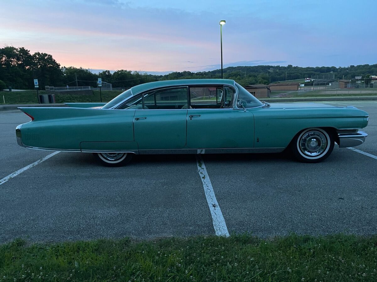 1960 Red Cadillac Fleetwood Sedan