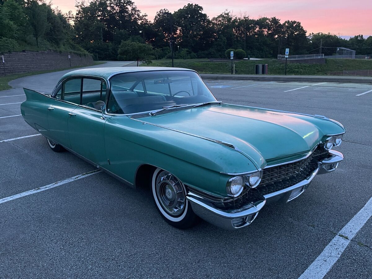1960 Red Cadillac Fleetwood Sedan