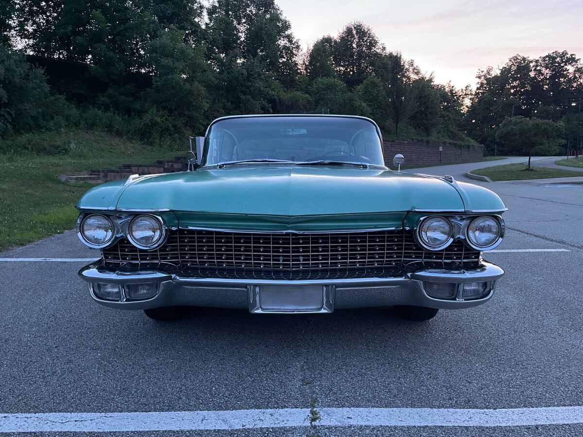 1960 Red Cadillac Fleetwood Sedan