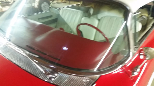 1960 Red Cadillac DeVille Convertible