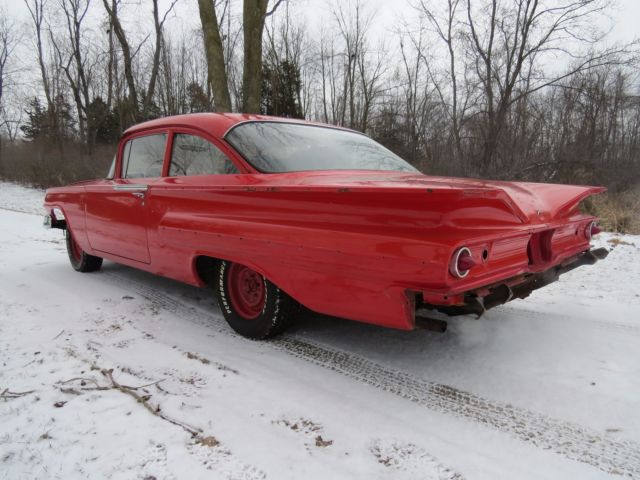 1960 Red Chevrolet Bel Air/150/210