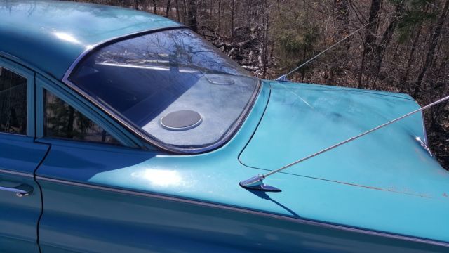 1960 Blue Chevrolet Impala 4 Dr. Sedan
