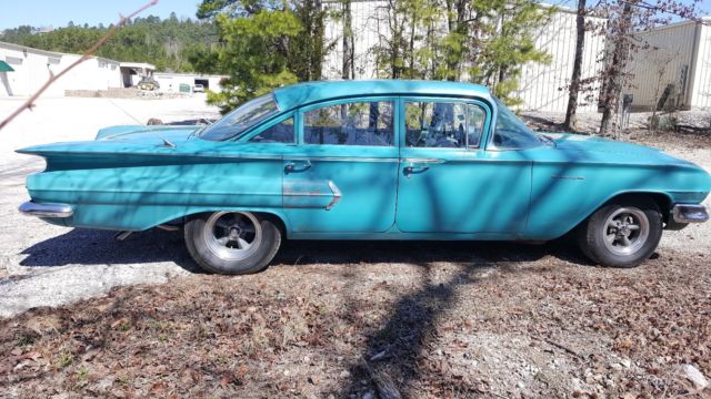 1960 Blue Chevrolet Impala 4 Dr. Sedan