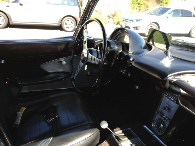 1960 Black w/ silver cove Chevrolet Corvette Convertible