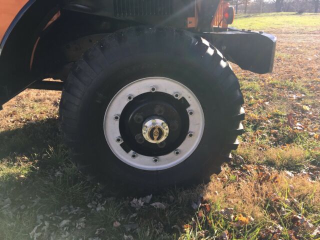 1960 Orange/black Dodge Power Wagon pick up
