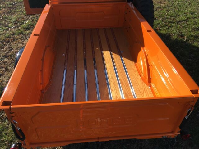 1960 Orange/black Dodge Power Wagon pick up