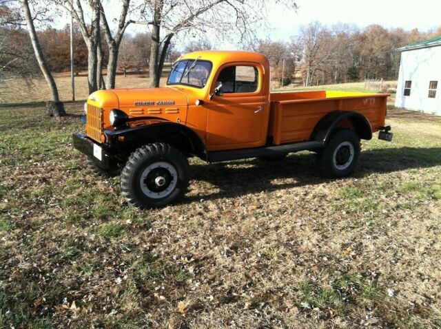 1960 Orange/black Dodge Power Wagon pick up