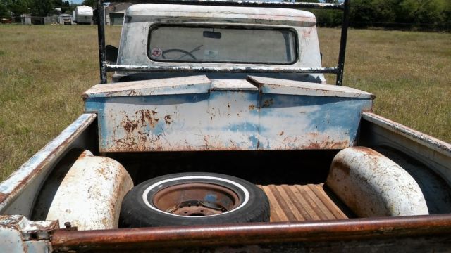 1960 black Ford F-100 Standard Cab Pickup