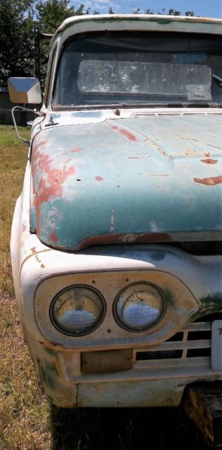 1960 black Ford F-100 Standard Cab Pickup