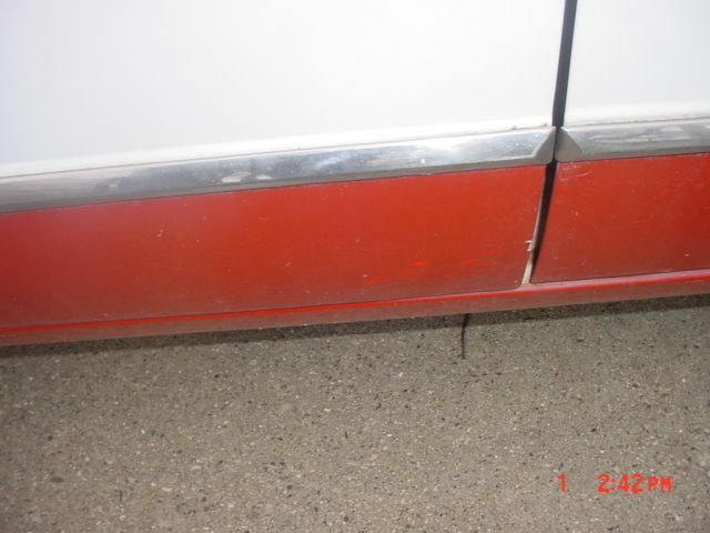 1960 white/red Plymouth Valiant Sedan