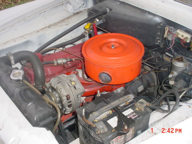 1960 white/red Plymouth Valiant Sedan