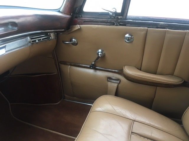 1961 light red Mercedes-Benz 220SE