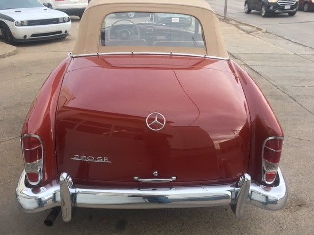1961 light red Mercedes-Benz 220SE