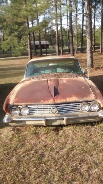 1961 Yellow Buick LeSabre Sedan