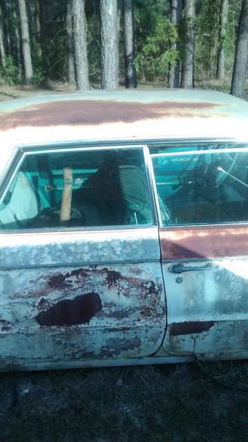 1961 Yellow Buick LeSabre Sedan