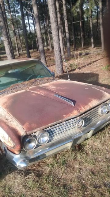 1961 Yellow Buick LeSabre Sedan