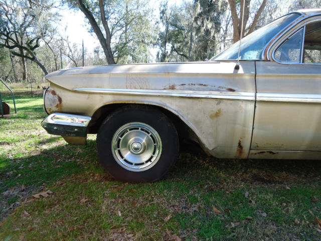 1961 Gold Chevrolet Impala Sedan