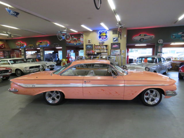 1961 Orange Chevrolet Impala Coupe